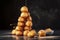 A mouth-watering tower of delicate croquembouches, filled with caramel. 